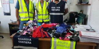 Vendita di merce contraffatta e kitesurf irregolare: multe e sequestri
